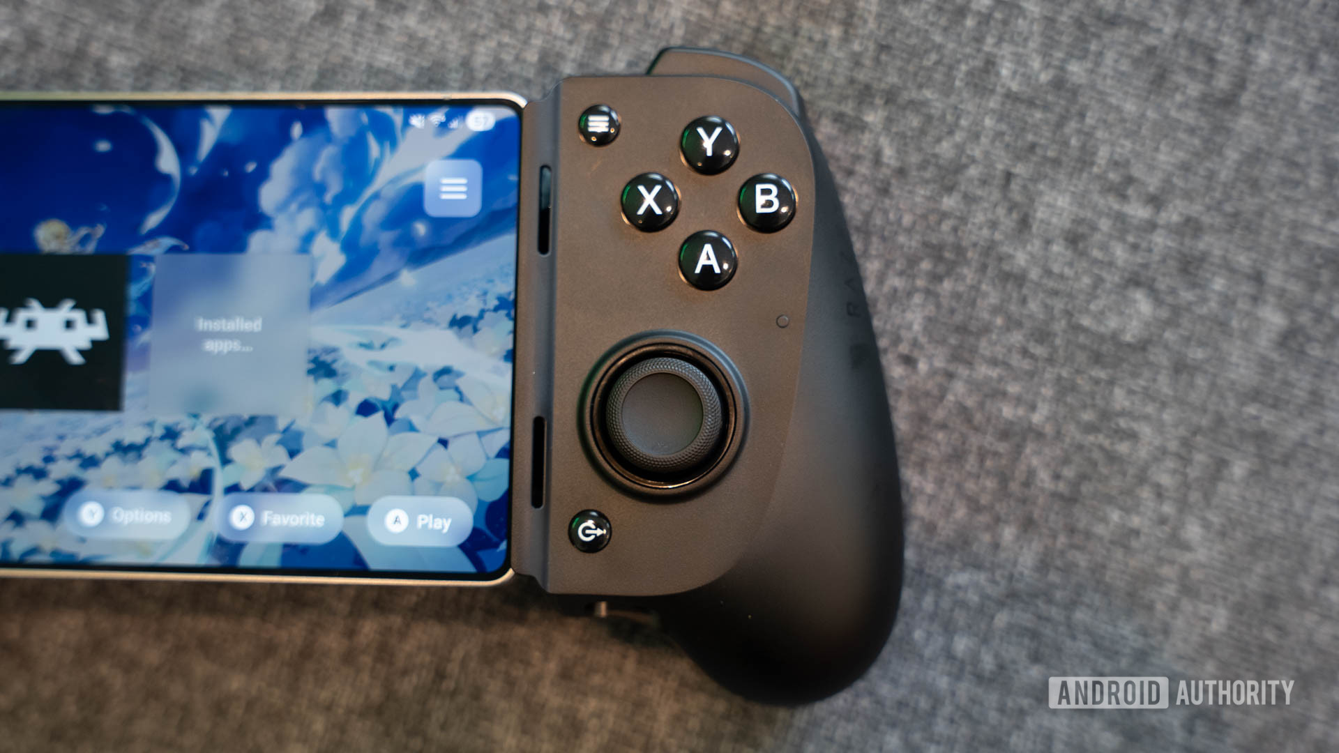 Botões da face do Razer Kishi V3 e bastão direito