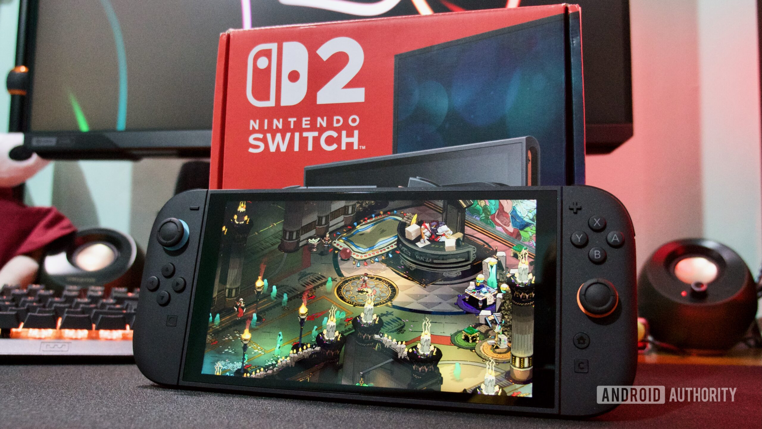 Nintendo Switch 2 na frente de Box Hades Nintendo Switch 2 na frente de Box Hades