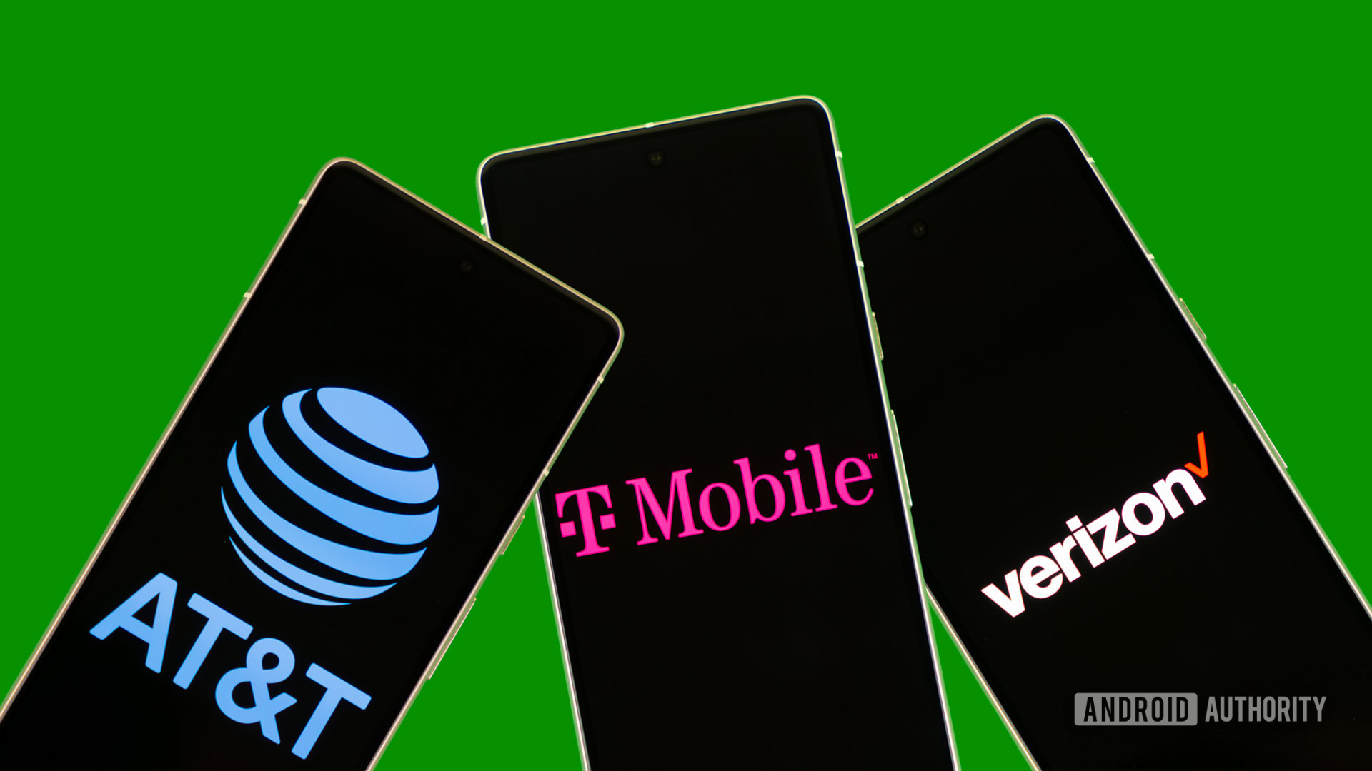 Telefones mostrando a Verizon, AT&T e T Mobile Logos Stock Photo (4)