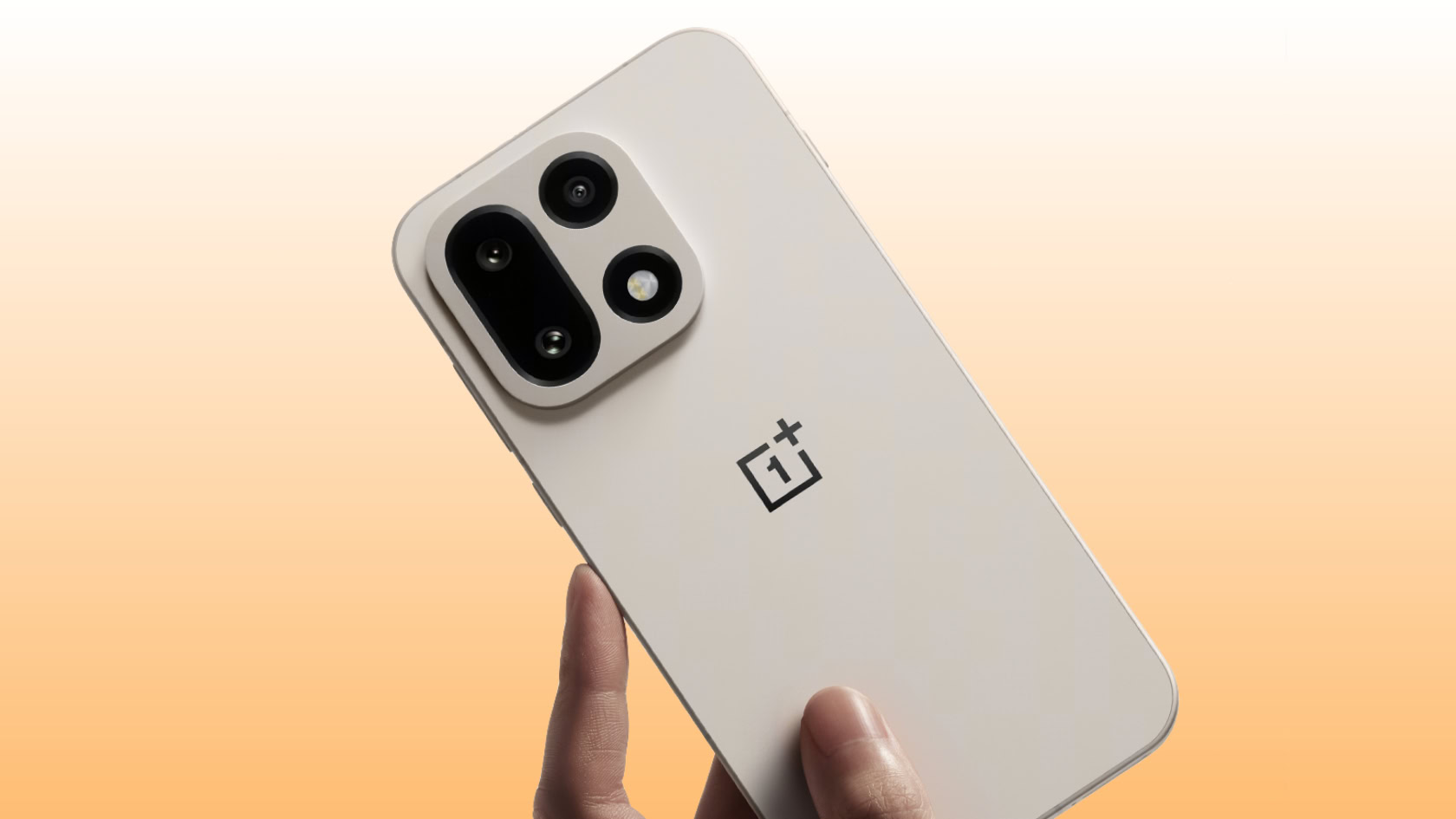Uma renderização do OnePlus 15 contra um fundo gradiente laranja e branco.